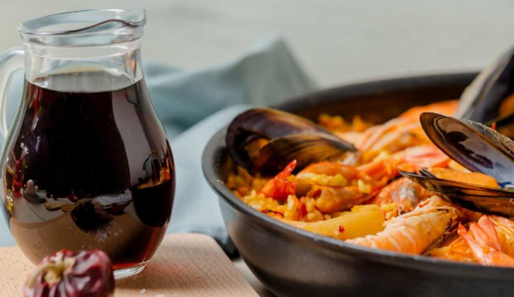 Illustrazione di un pranzo (Canva FOTO) - marinecue.it
