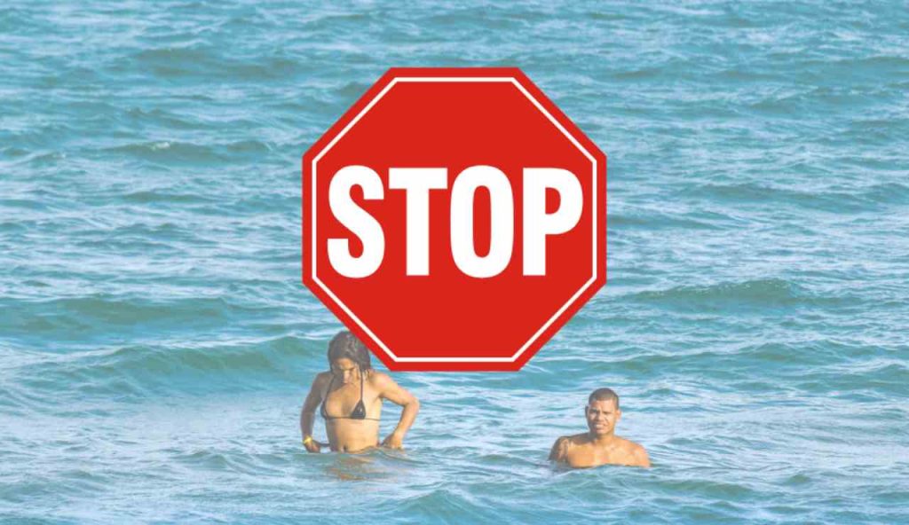 Illustrazione di stop alla balneazione (Canva FOTO) - marinecue.it
