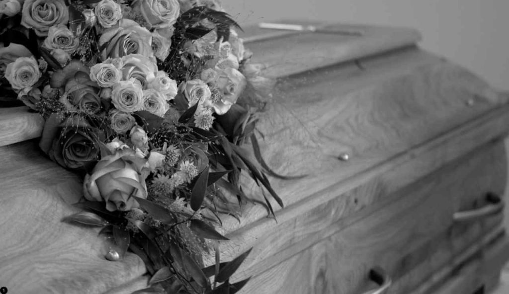 Illustrazione di un funerale (Canva FOTO) - marinecue.it