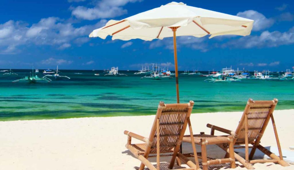 Illustrazione di una vacanza al mare (Canva FOTO) - marinecue.it