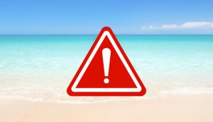 Illustrazione di una spiaggia pericolosa (Canva FOTO) - marinecue.it